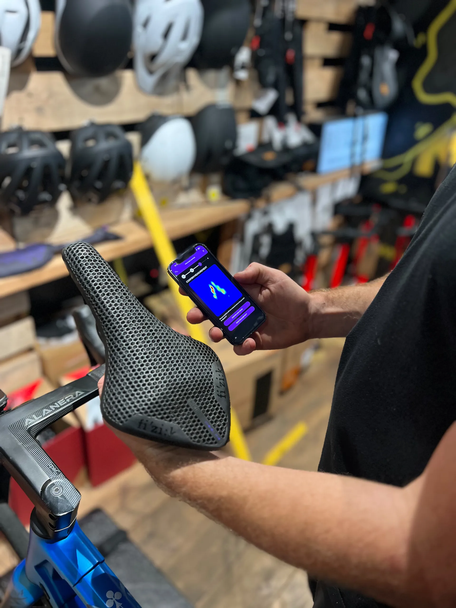 A Fizik Adaptive saddle alongside the rider&rsquo;s pressure-mapping results at Big Maggy&rsquo;s
